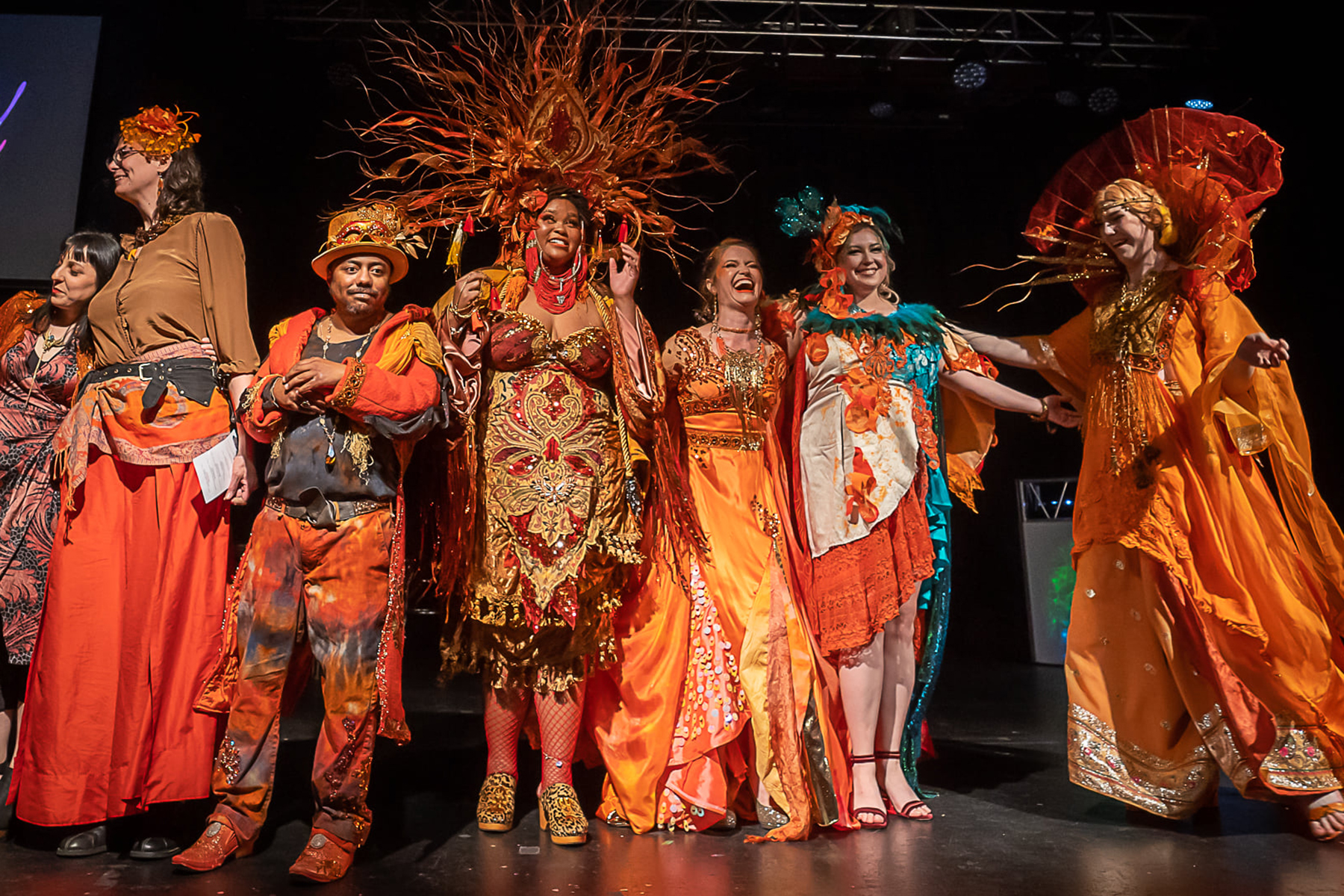 image of 7th annual goodwill fashion show seven actors smiling after performance